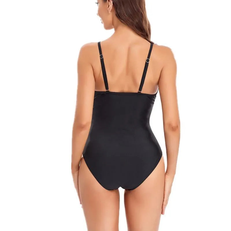 Ladies' backless mesh one-piece swimsuit in solid black or blue, showing high elasticity fit.