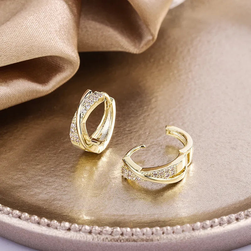 Geometric copper earrings with 14K yellow zircon finishing, showing architectural jewellery design