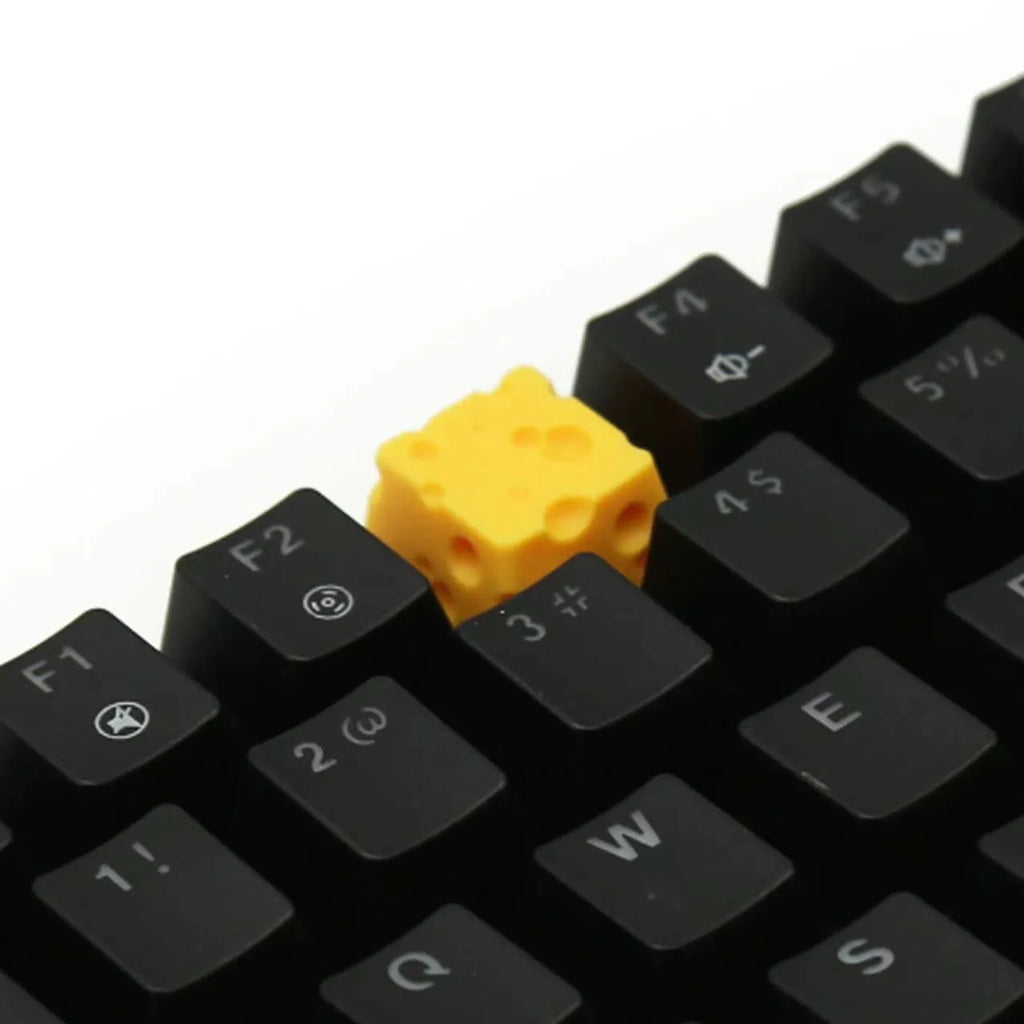 Yellow resin cheese artisan keycap for mechanical keyboards with 3D sculpted design