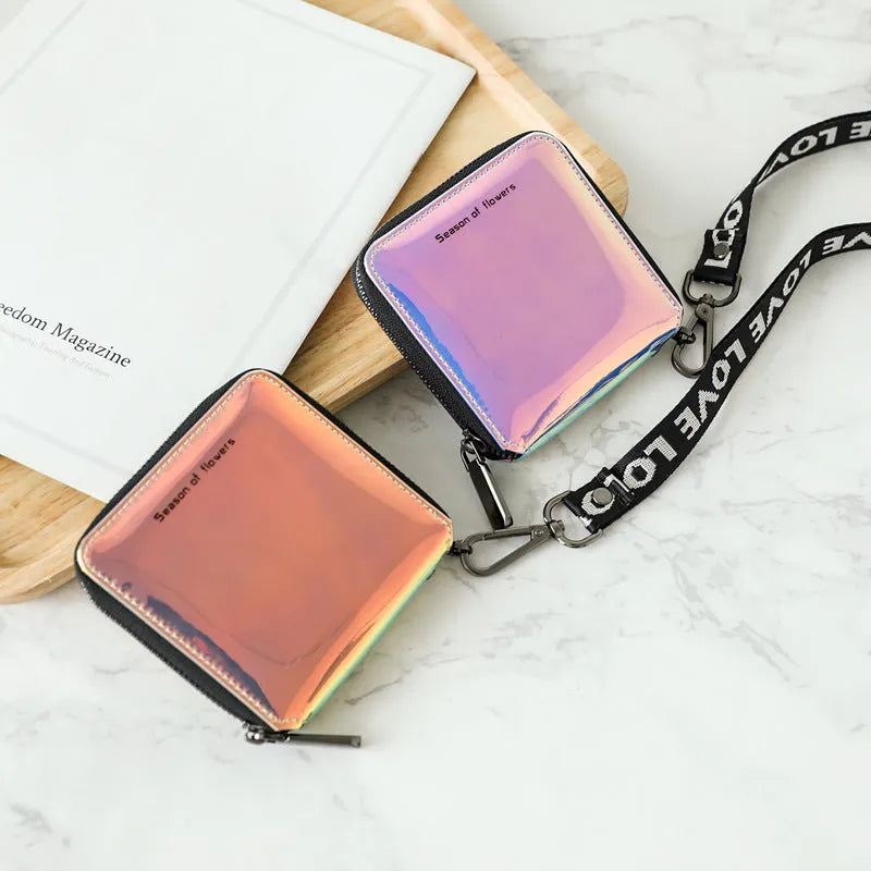 Women's short folding Korean style wallet in PU leather, shown in crystal blue, glitter, and green colours.