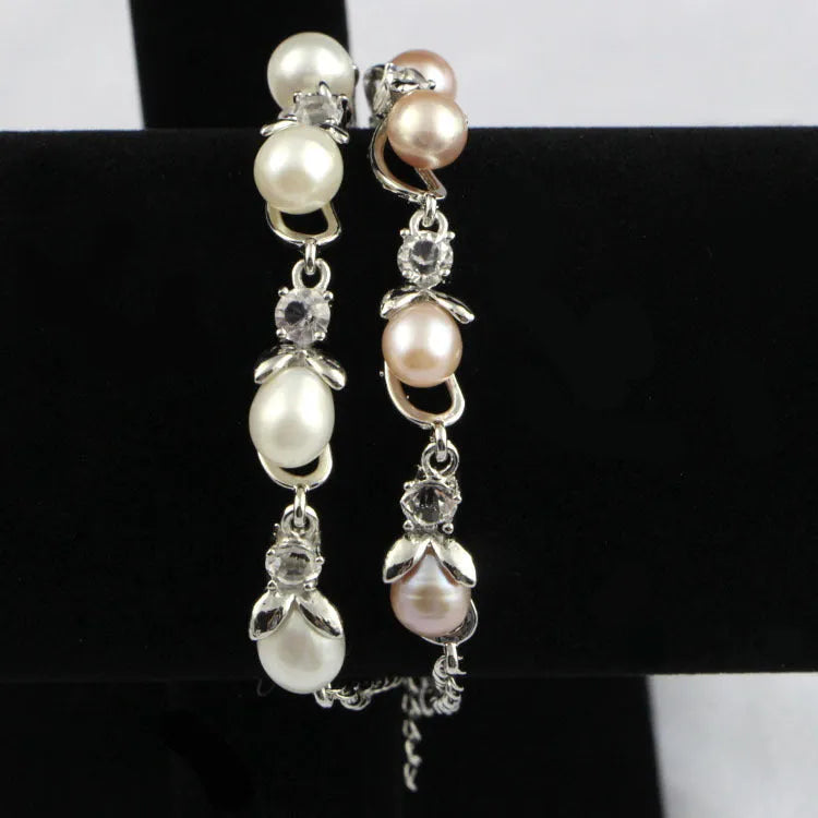 Freshwater pearl bracelet with Korean crown design on white background