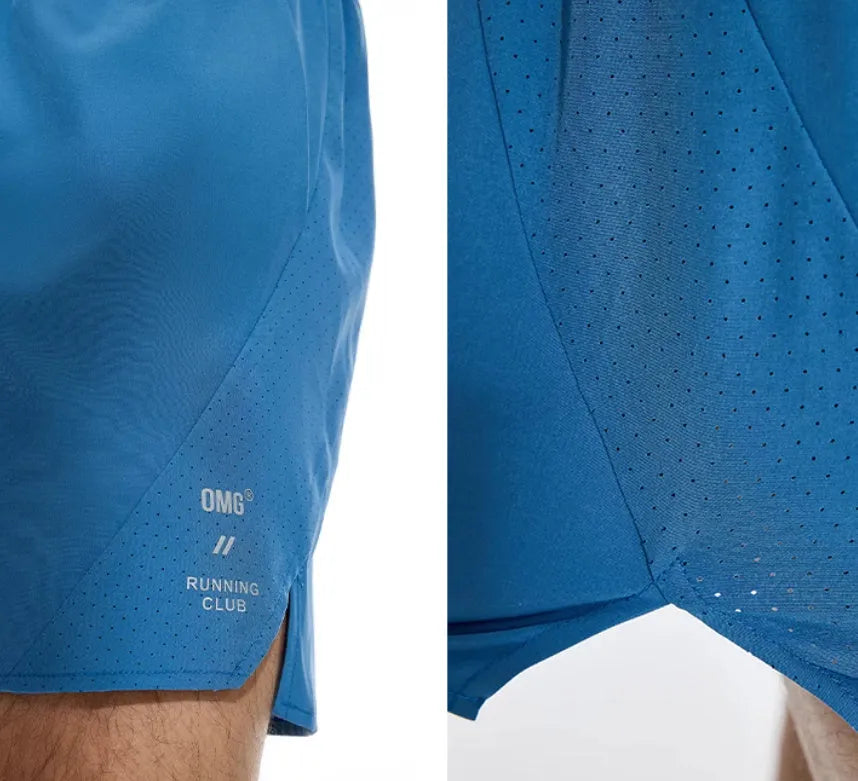 Laser-stitched black running shorts with stretch Spandex fabric laid flat.