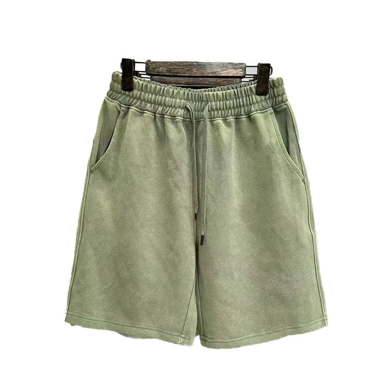 Men's cotton distressed shorts in straight leg style with fifth pants length