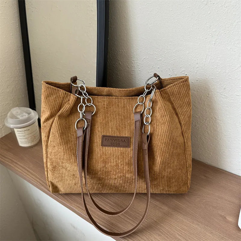Corduroy one-shoulder tote handbag in horizontal square shape with three-dimensional pockets
