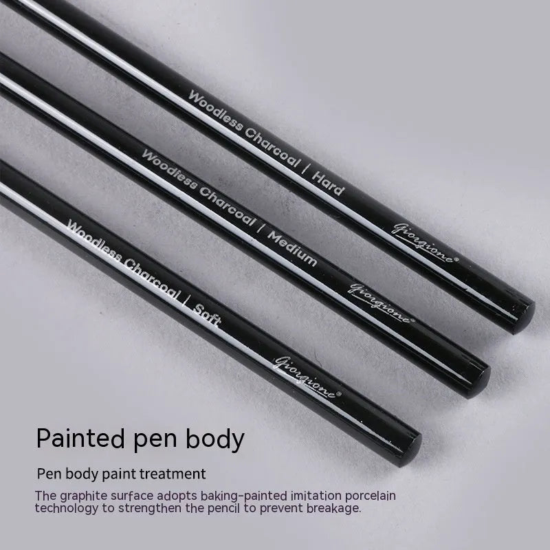 Set of nine art pencils on a card: six graphite pencils and three darker carbonized pencils in wooden casings.