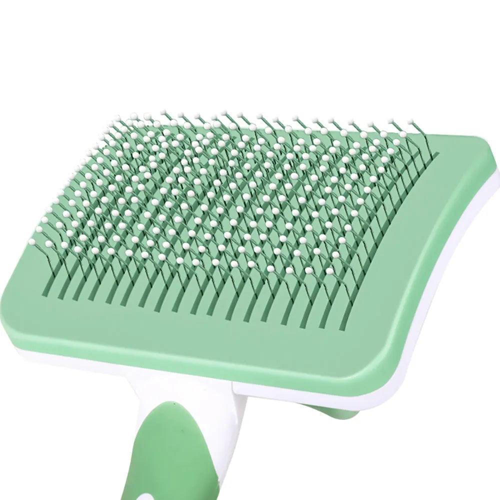Self-cleaning slicker brush for dogs and cats with one-click hair removal button, available in green, orange, and pink