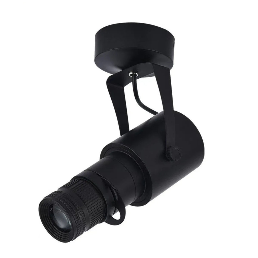 Black surface-mounted LED spotlight with aluminium shell for restaurant lighting