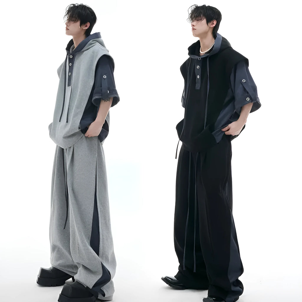 Men's black polyester hooded jacket with three-dimensional stitching on sleeves, paired with matching trousers