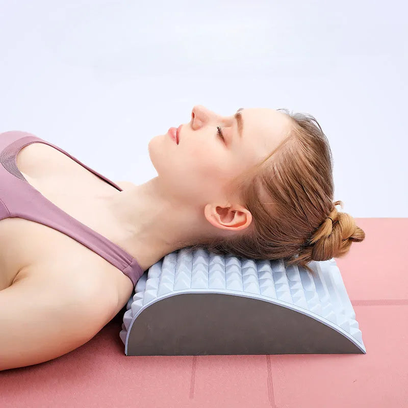 Blue EVA foam back stretcher pillow for neck and lumbar pain relief, 33cm long on a chair