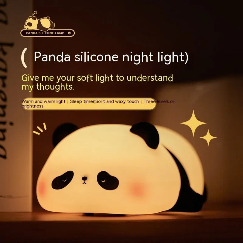 Cartoon panda night light with soft white glow on bedroom bedside table