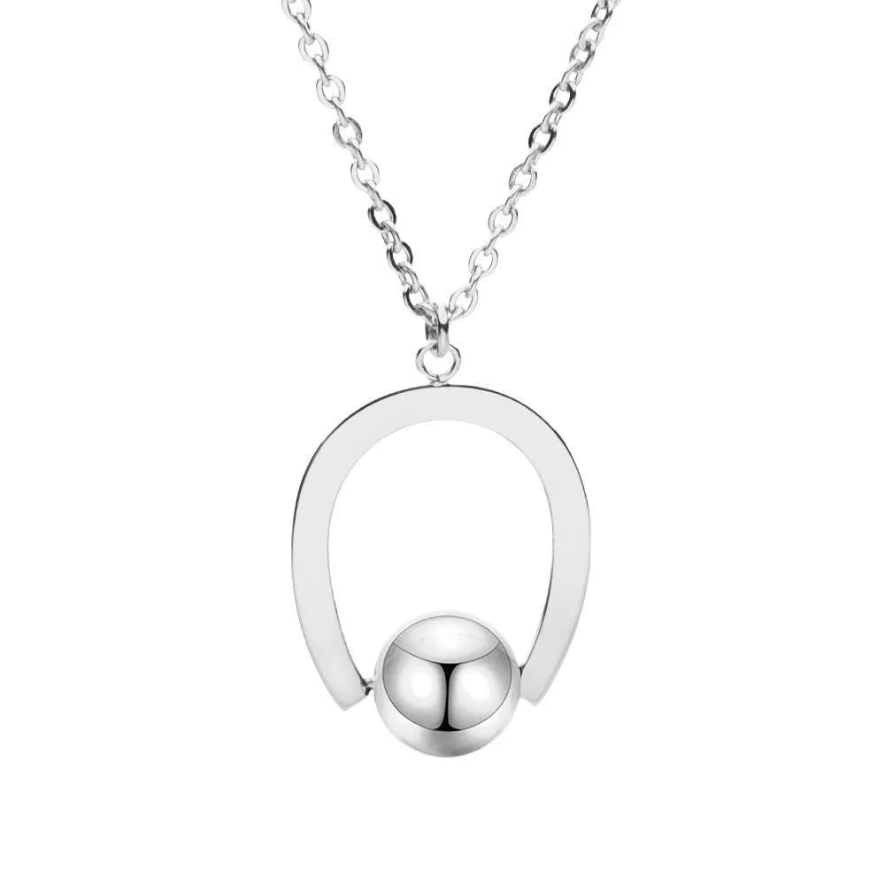 Adjustable stainless steel necklace with geometric pendant on cross chain