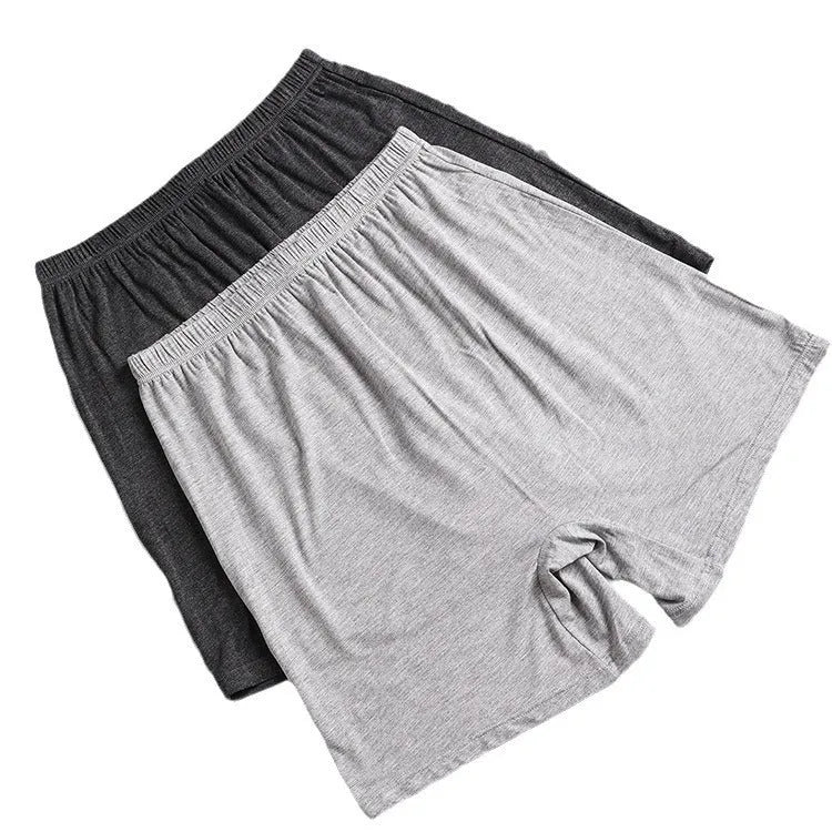 Solid colour modal high-waist men's boxer shorts in black, blue, grey, and brown.