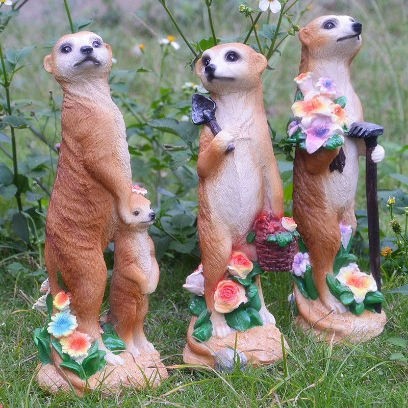 Straw hat wearing mongoose garden ornament in synthetic resin