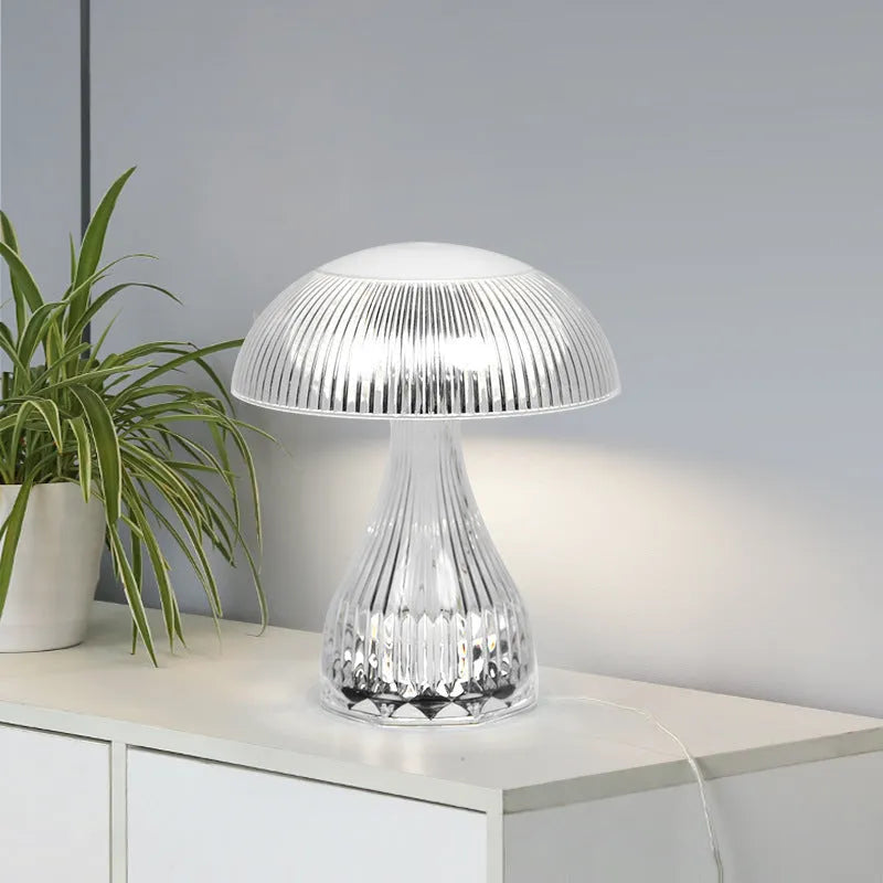 White rechargeable touch night lamp with USB charging cable showing three colour lighting options