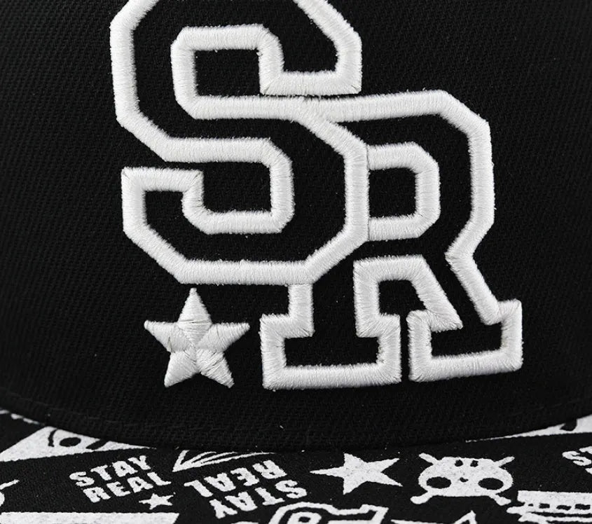 Cotton baseball hat with front letter embroidery in black colour, showing adjustable strap and dome crown.