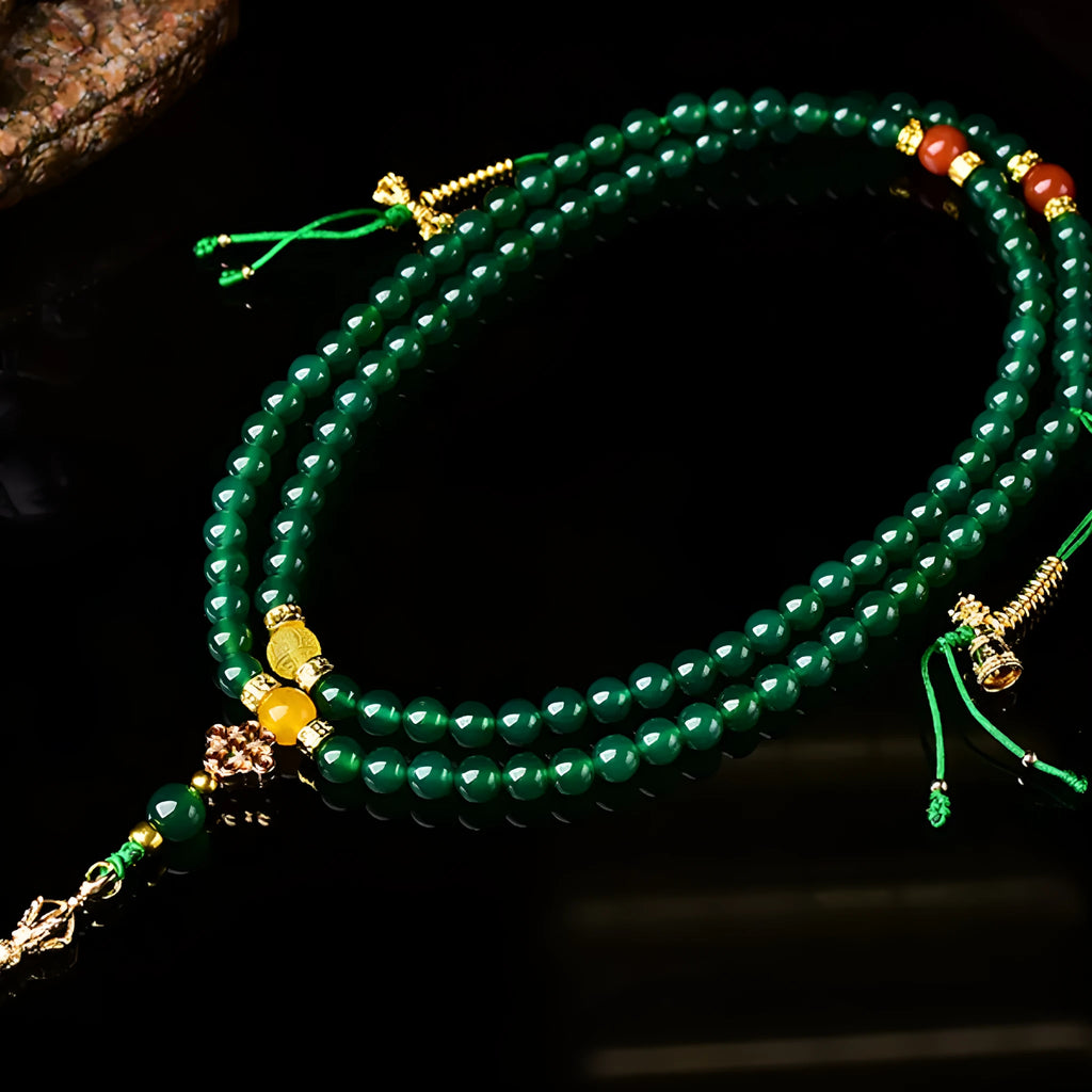 Handcrafted multi-strand bracelet with green agate beads from Brazil, showing size options.
