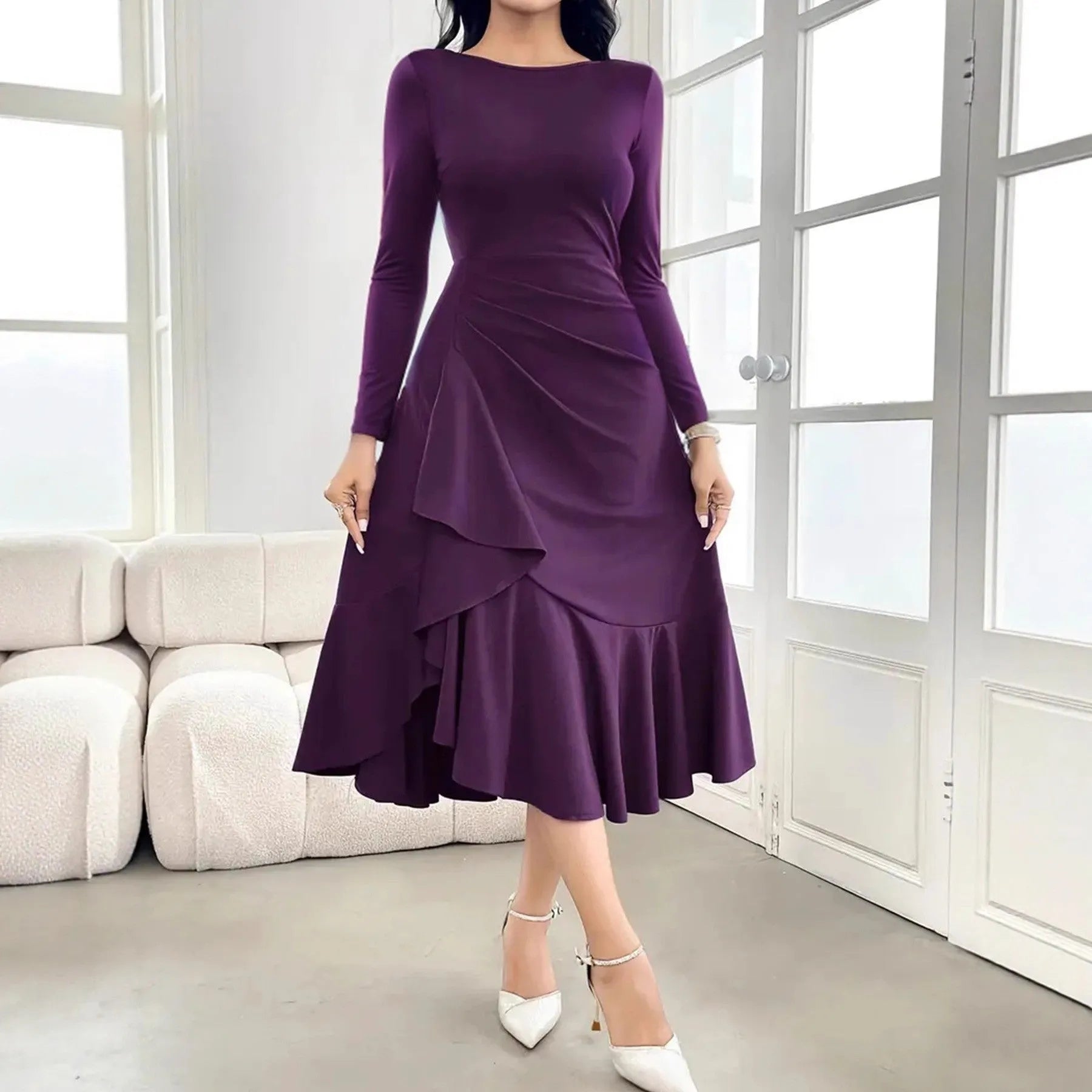 Purple women's long sleeve pullover dress with round neck and ruffle details on mannequin