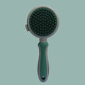 Two-sided pet grooming brush showing slicker brush side and silicone massage side in green colour