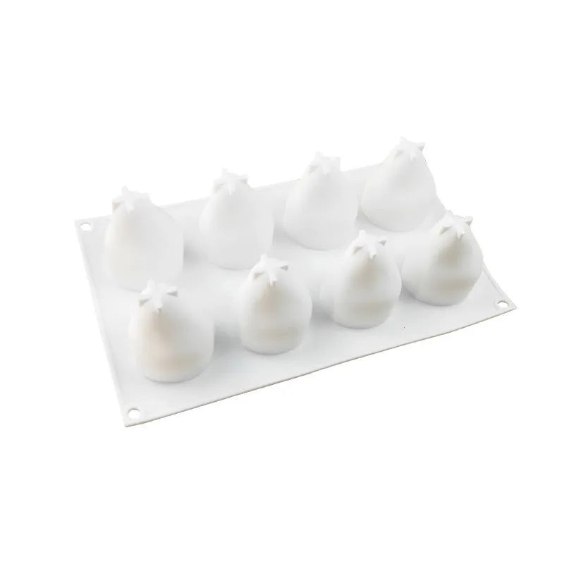 Flexible silicone baking mould shaped like a pineapple and pine cone for making Italian mousse desserts.