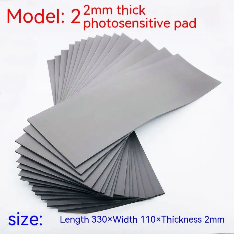 Black and gray plastic light-sensitive mat for seal making measuring 330x110mm