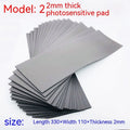 Black and gray plastic light-sensitive mat for seal making measuring 330x110mm