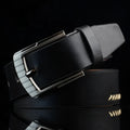 Men's retro styling pin buckle belt in black, brown, and white colour options showing pattern detailing