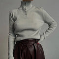 Silver grey retro half-turtleneck single-breasted pullover sweater on a model, slim fit.