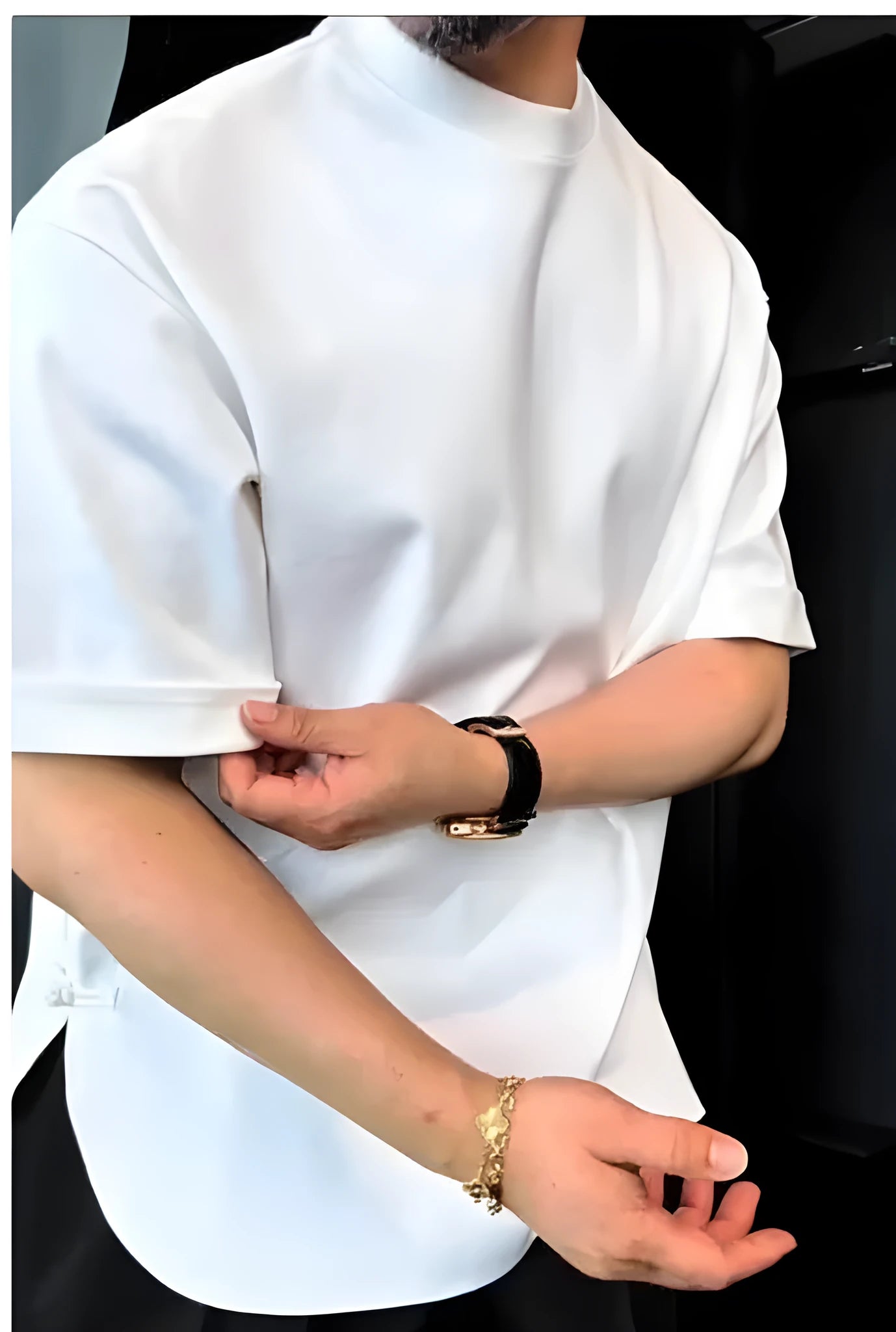 Men's white round hem T-shirt with a button detail on the front curved hem.