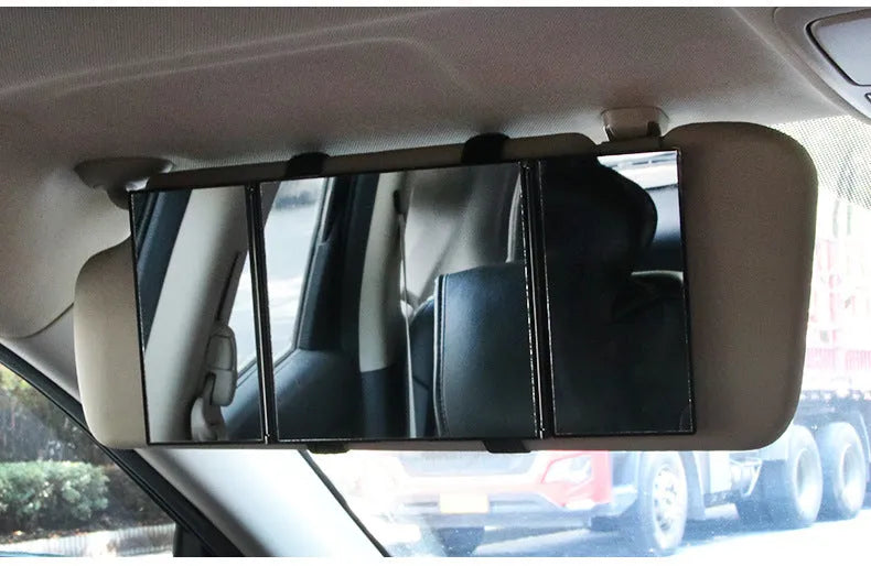 Silver car folding makeup mirror shown both closed and opened to show size difference
