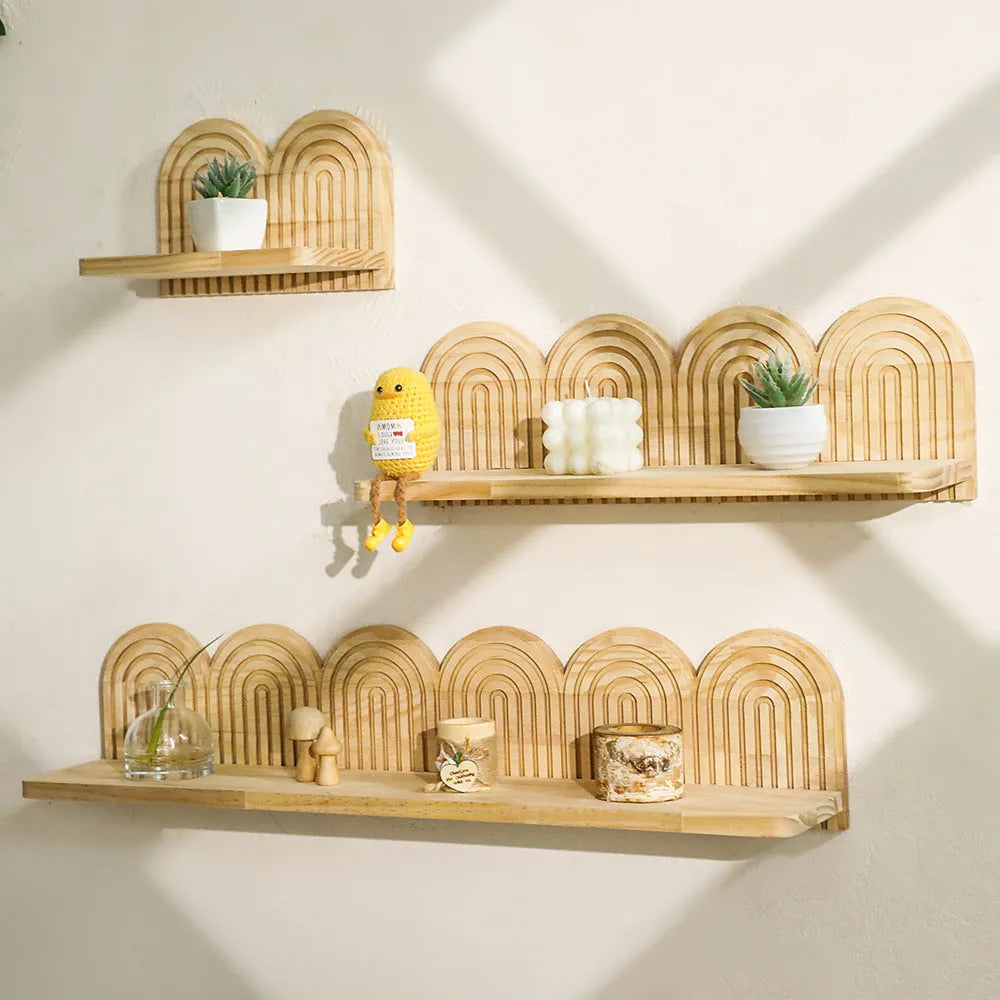 Wooden multi-layer wall storage rack holding potted plants on horizontal shelves