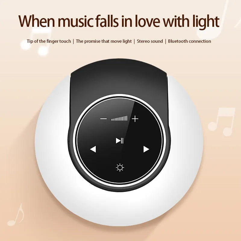 Blue cubic Bluetooth desk lamp speaker with touch controls and folding head on wooden desk