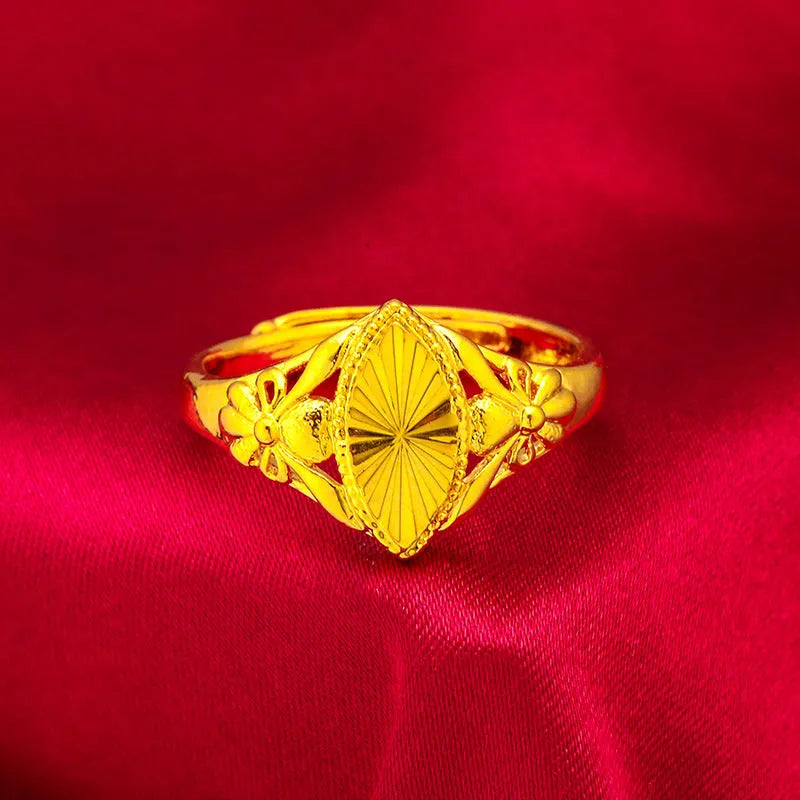 Gold geometric open flower ring with textured surfaces, brass construction with electroplating