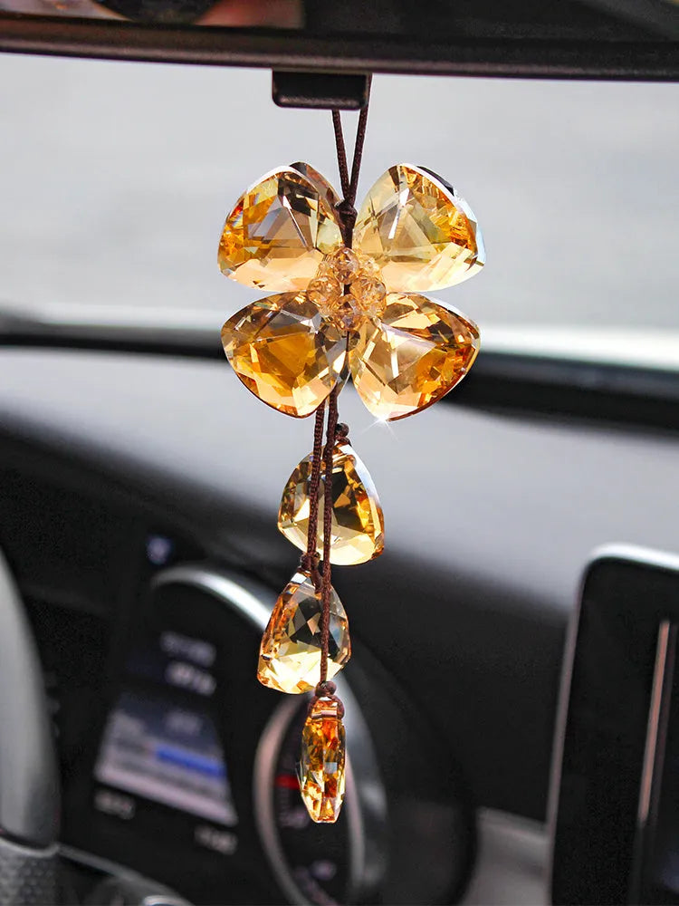 Crystal four leaf grass car pendant in four colour options hanging from rearview mirror