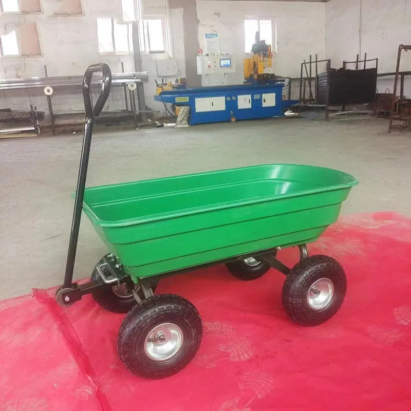 Green four-wheel plastic dump truck with steel reinforcement and dump mechanism for agricultural material transport