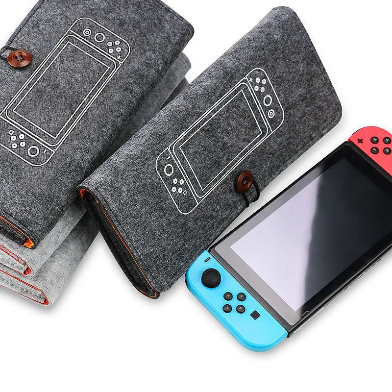 Black felt protective pouch for Nintendo Switch console showing game card slots and double layer design