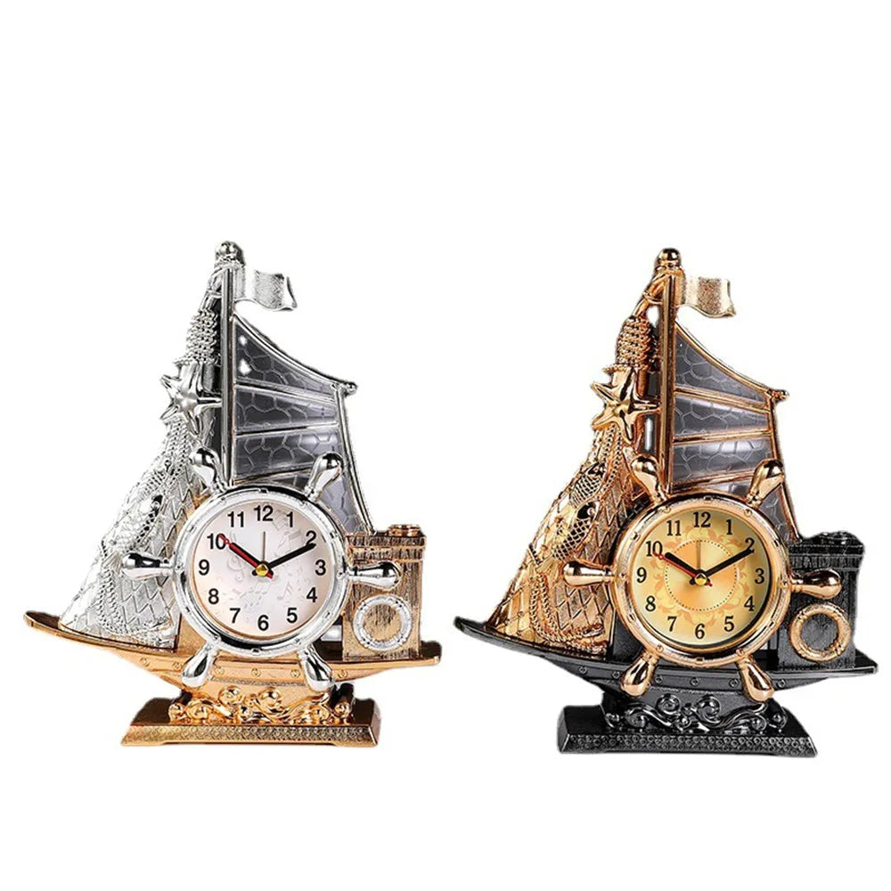 Fashion bedroom clock with gold or silver finish on plastic housing measuring 22.6cm wide