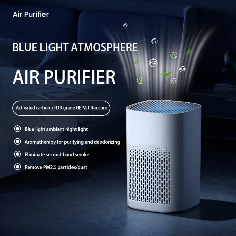 Compact white desktop air purifier with USB cable on wooden desk