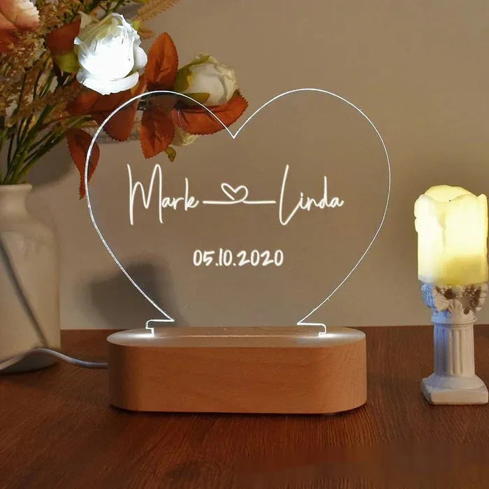 Personalised acrylic LED night light showing custom names and date, modern art design, 20cm by 11.5cm