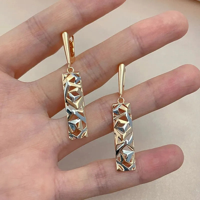 Rectangular two-tone hollow stud earrings with electroplated geometric design