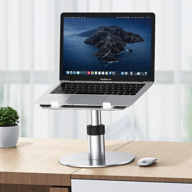 Silver aluminium car laptop stand shown at an adjusted height on a surface.