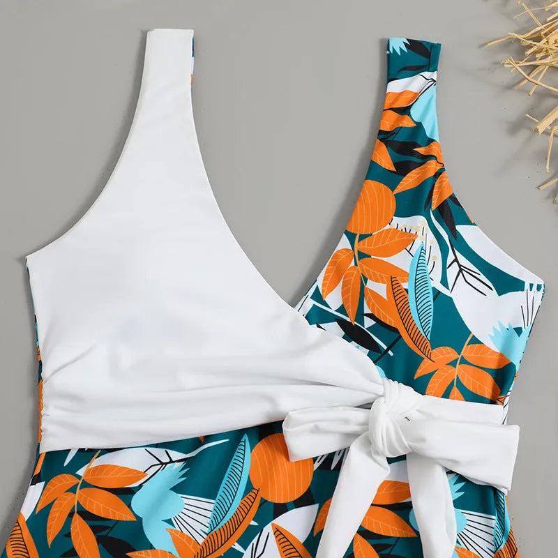 Women's high waist one-piece swimsuit in printed pattern, available in black or white.