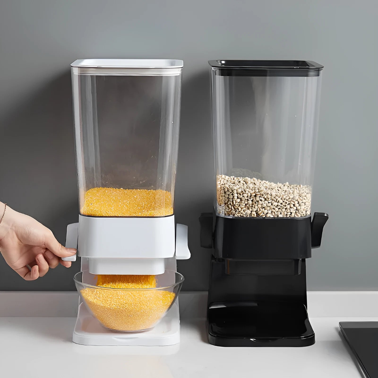 Countertop cereal dispenser in white with clear container and black lever showing chute opening