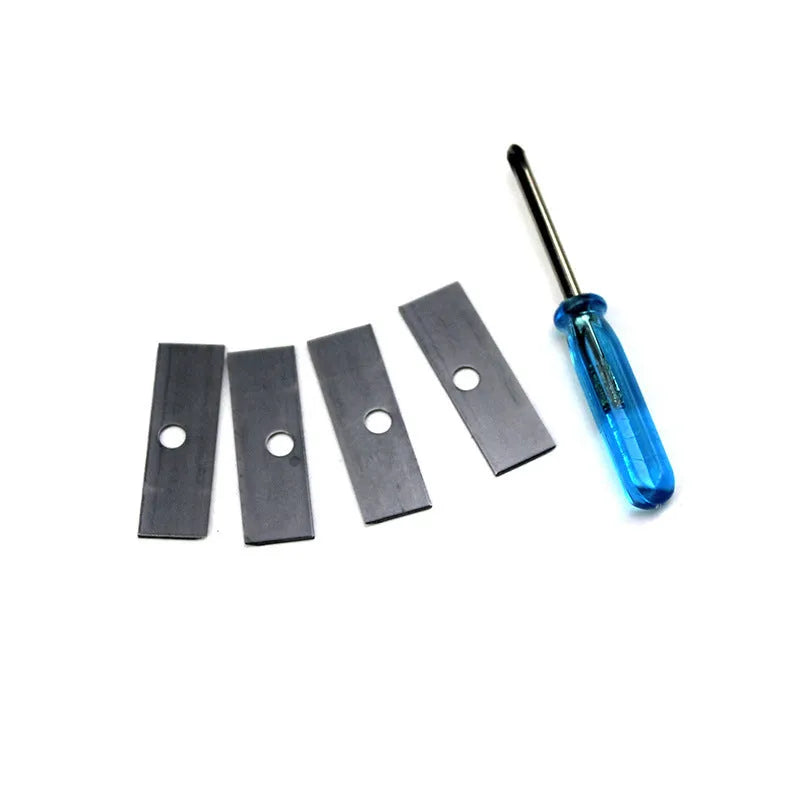 Four-hole geometric plastic pencil sharpener with included screwdriver on a white background.