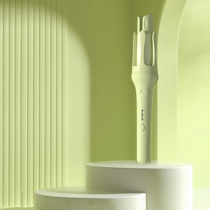 White automatic hair curler with 32mm barrel showing pink or purple colour accents and included power adapter