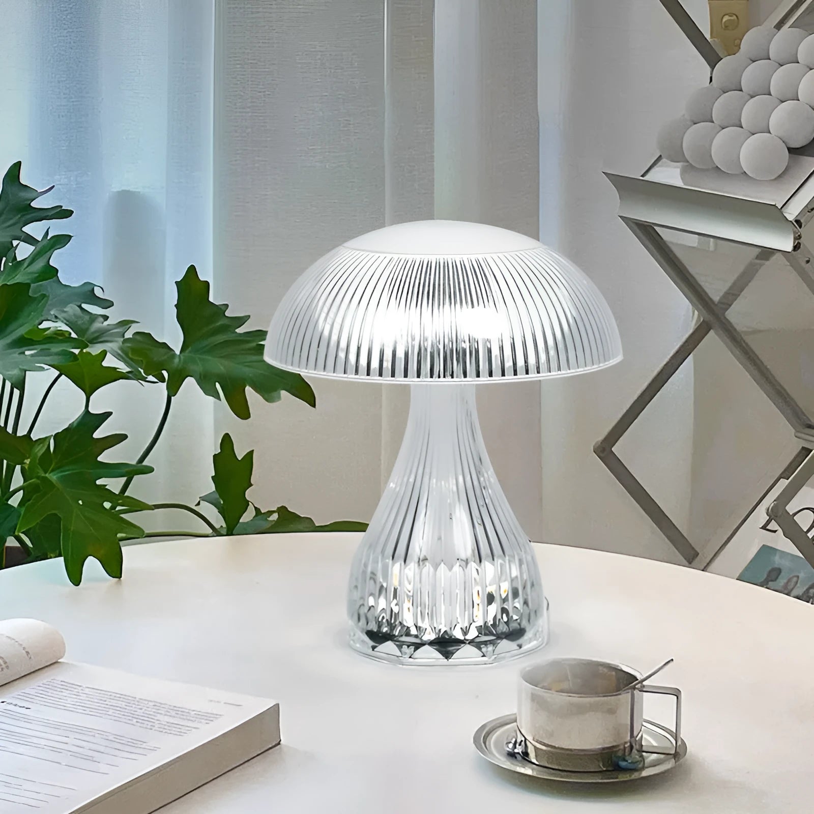 White rechargeable touch night lamp with USB charging cable showing three colour lighting options