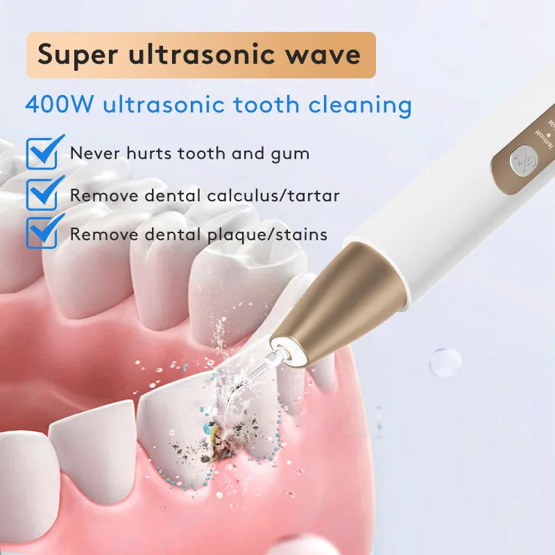 Gold coloured ultrasonic tooth cleaning device with metal scaler tip for tartar and stain removal.