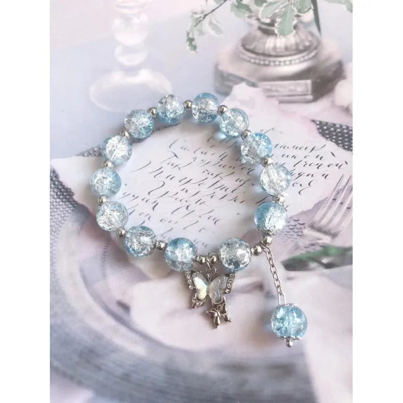 A Chinese style glass bead bracelet for women featuring bamboo joint design elements.