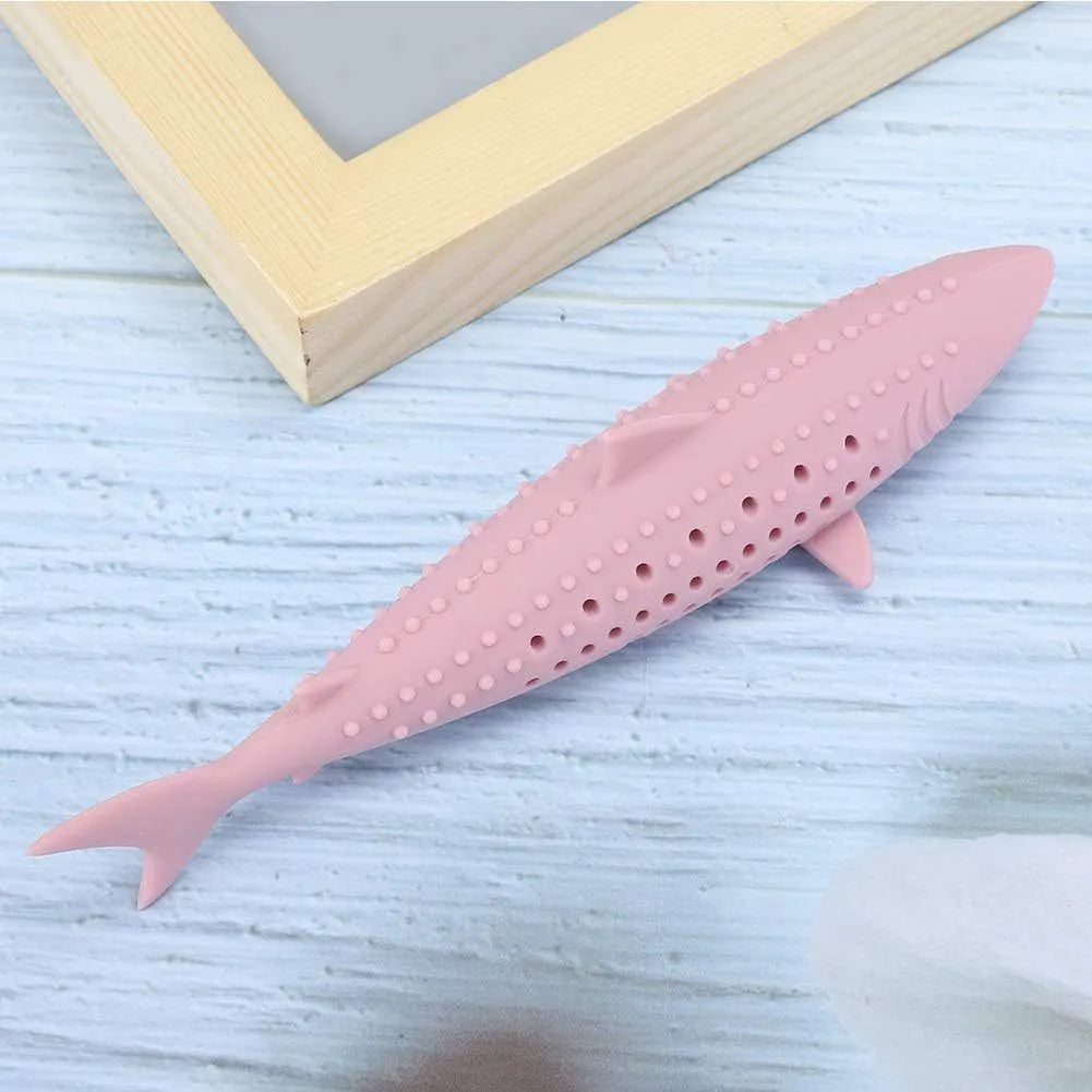 Silicone fish-shaped cat chew toy in green with breathable side holes for catnip
