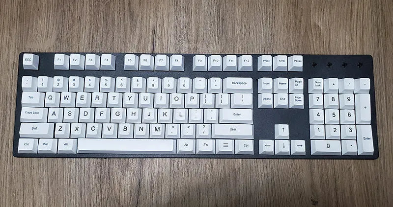 PBT thermal sublimation keycap set showing Japanese Russian Korean multilingual layouts with colour options