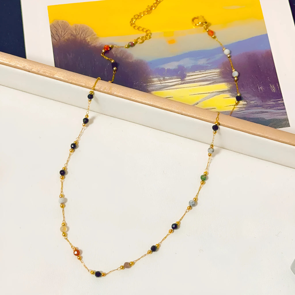 Gold electroplated titanium steel women's necklace with natural stone pendant on O-ring chain